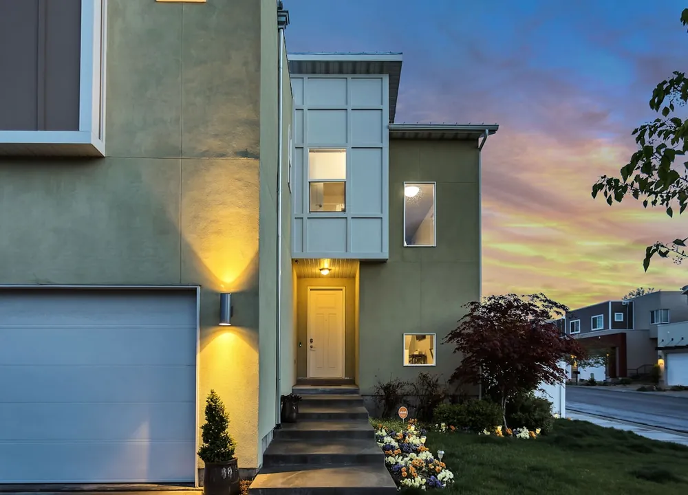 New-build home lit at dusk in Riverside South, south Ottawa